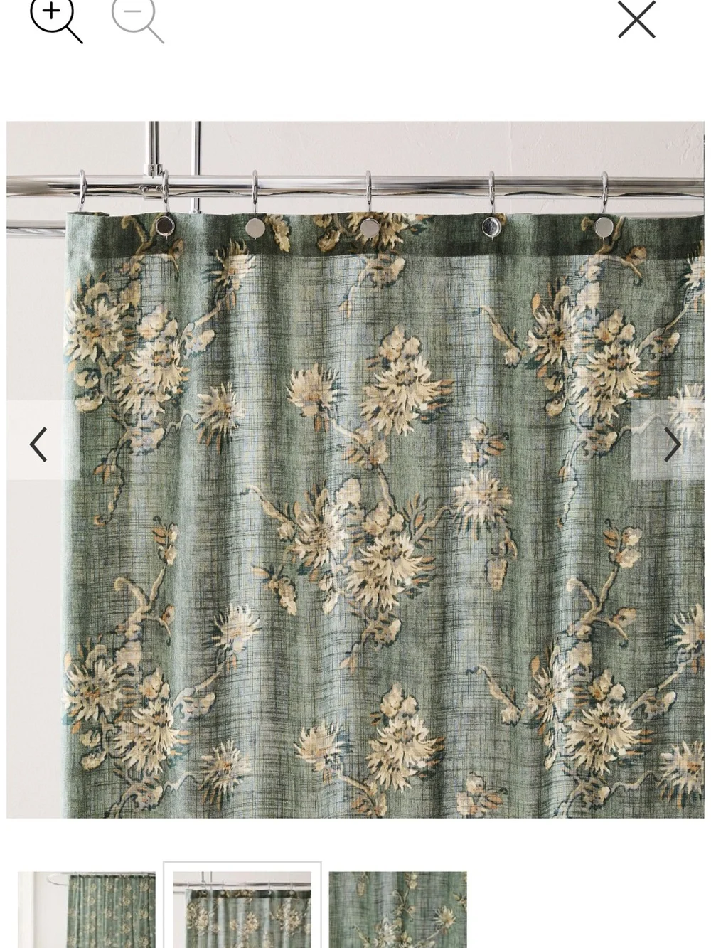 West Elm green floral shower curtain with cream and gold blooms